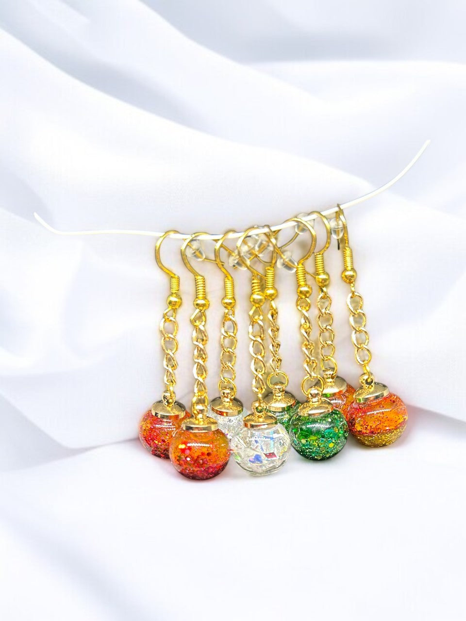 Boucle d'oreille boule de noël